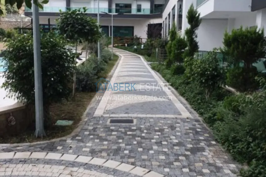 Квартира в районе Джикджилли меблированная с видом на море в комплексе класса люкс 26 