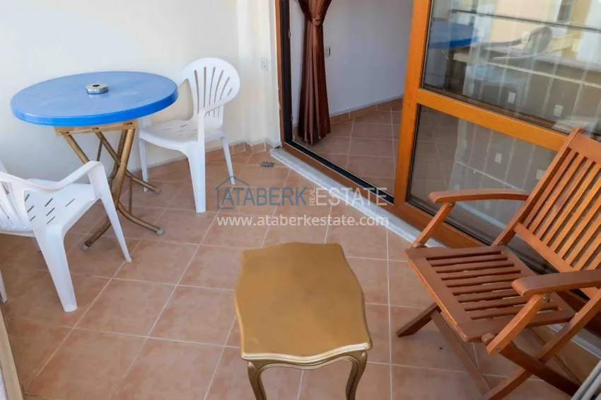 Приобрести Квартира двухкомнатная с мебелью в жилом комплексе в Махмутларе 29 