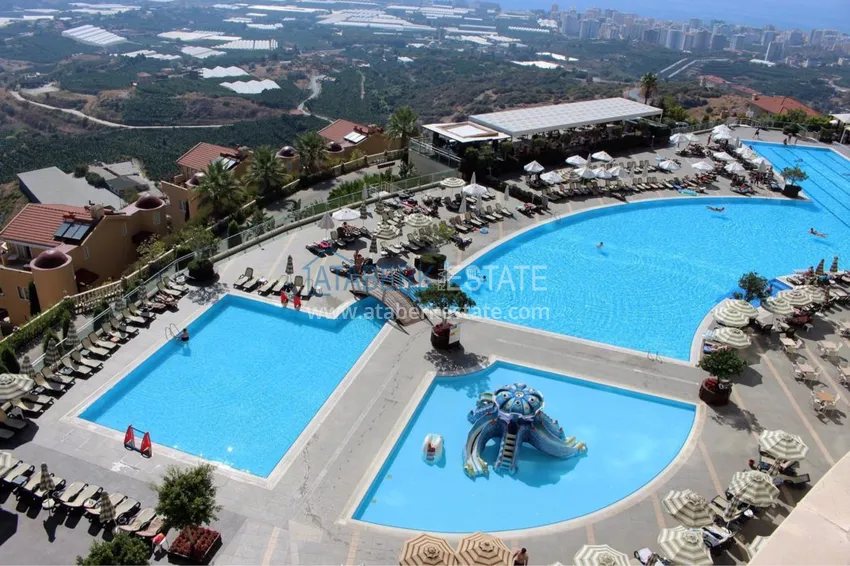 Квартира в Махмутларе с мебелью в элитном жилом комплексе отельного типа 3 