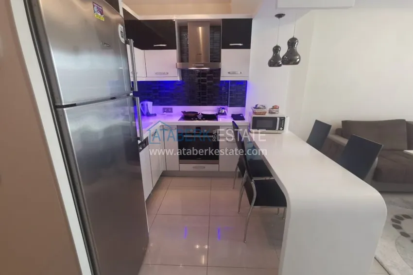 Приобрести Аренда квартиры в Алании, Махмутлар в престижном комплексе с частным пляжем А156  3 