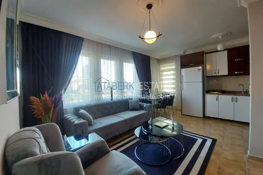 Приобрести Квартира в Махмутларе, с мебелью в жилом доме 2 