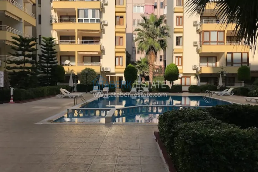 Квартира двухкомнатная с мебелью в жилом комплексе в Махмутларе 2 