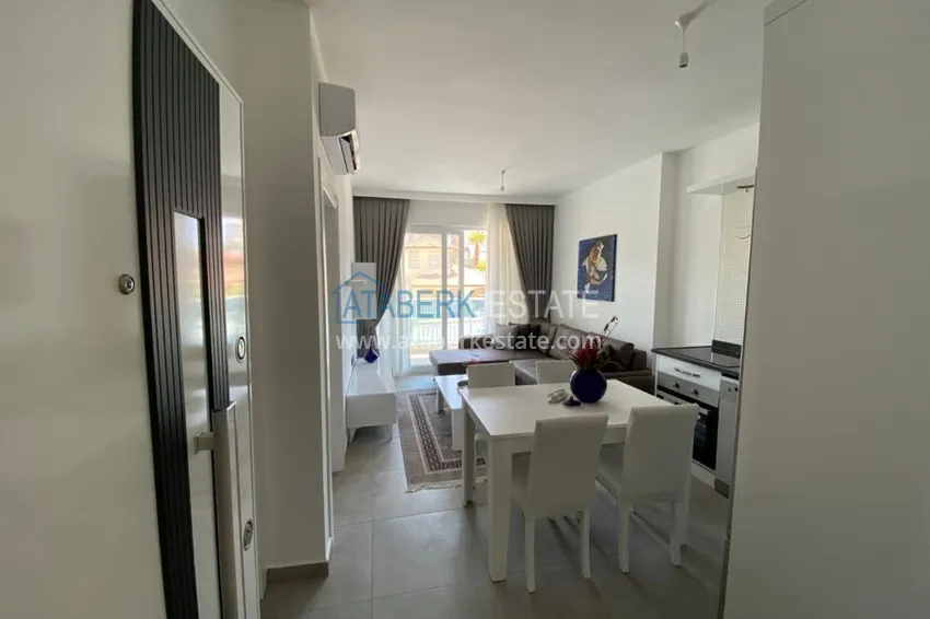 Приобрести Квартира в Махмутларе с новой мебелью в молодом комфортабельном комплексе 3 