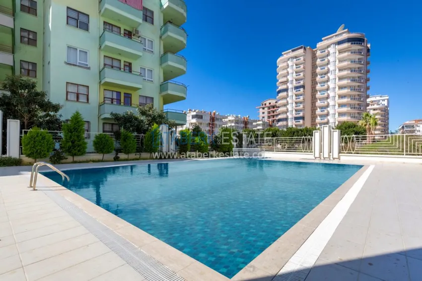 Квартира в Махмутларе с чистовой отделкой, 2 спальни, отдельная кухня  2 