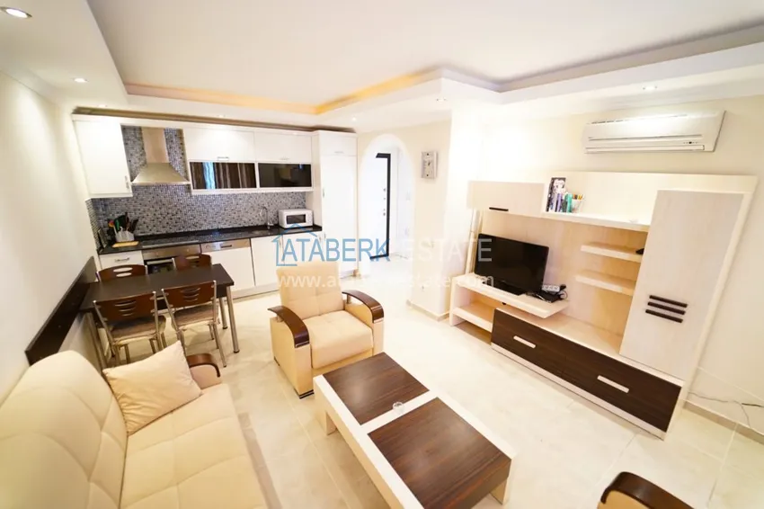 Приобрести Квартира в Махмутларе двухкомнатная с мебелью в комплексе рядом с морем 2 