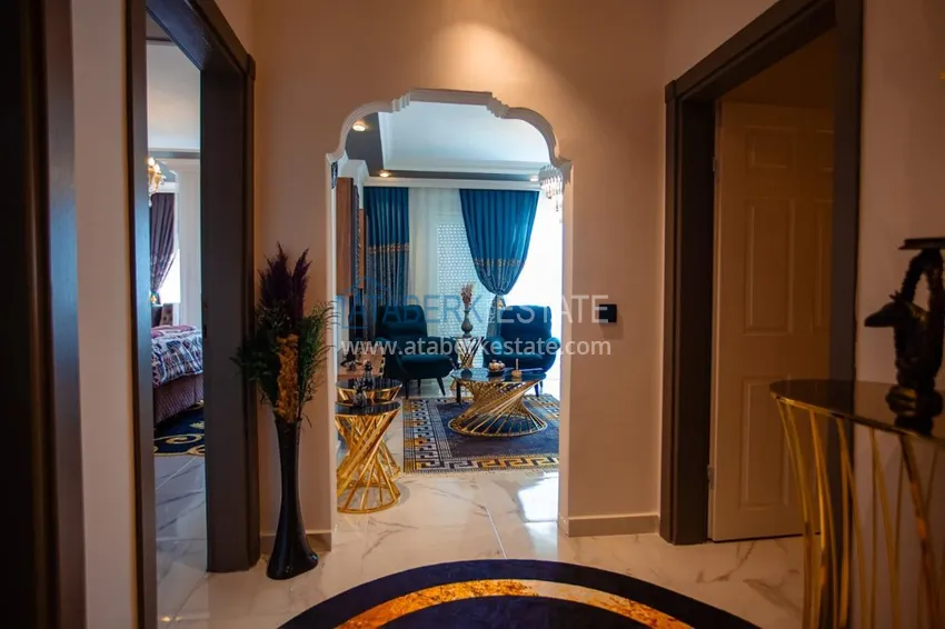 Приобрести Квартира в Махмутларе трехкомнатная, меблированная с видом на горы 2 