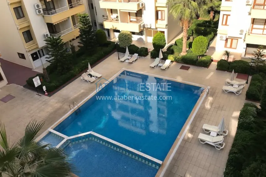 Приобрести Квартира двухкомнатная с мебелью в жилом комплексе в Махмутларе 30 