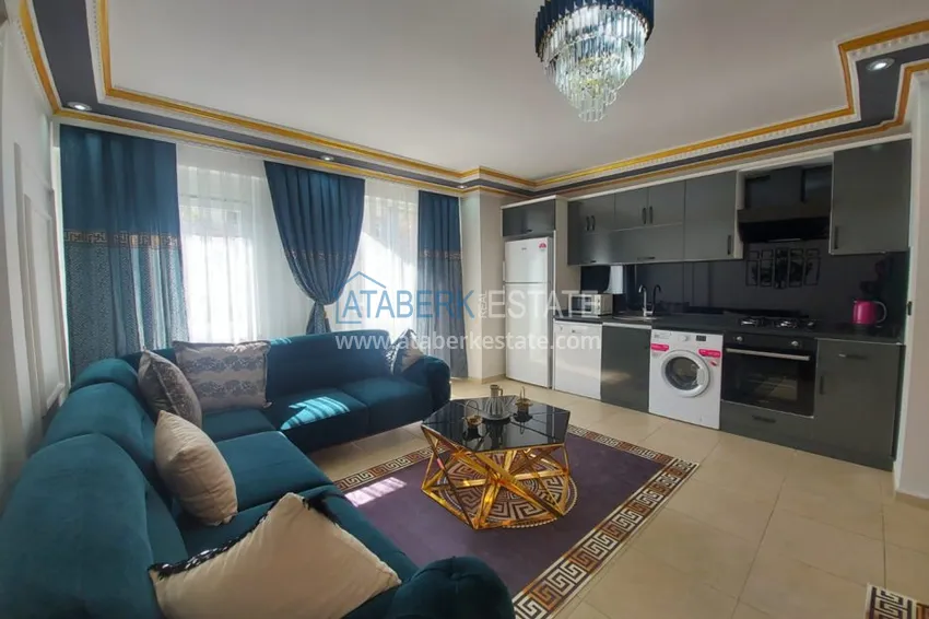 Приобрести Квартира в Махмутларе с мебелью в комплексе на центральной улице 4 