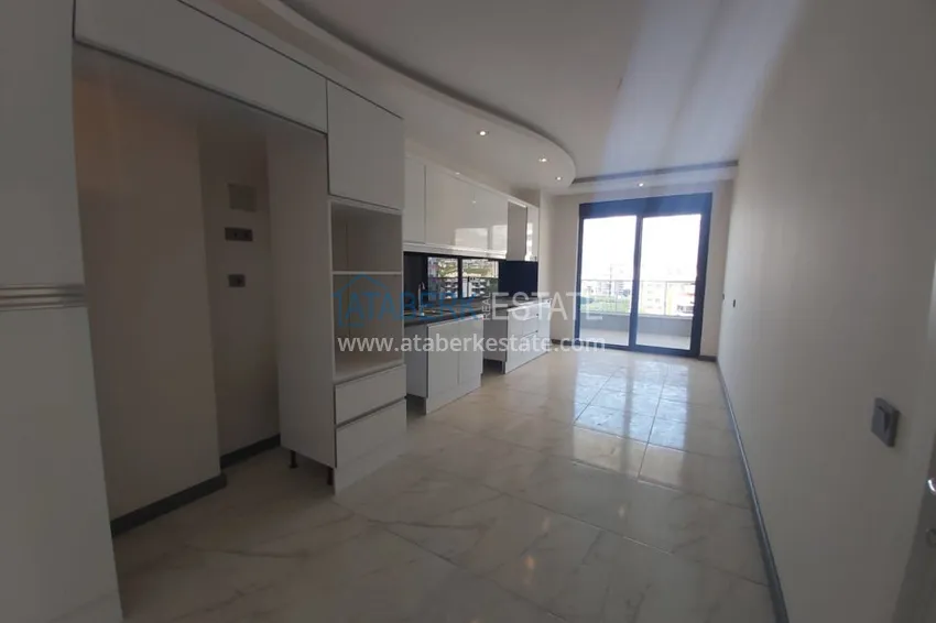 Приобрести Квартира в Махмутларе с отдельной кухней, в многоэтажной новостройке 3 