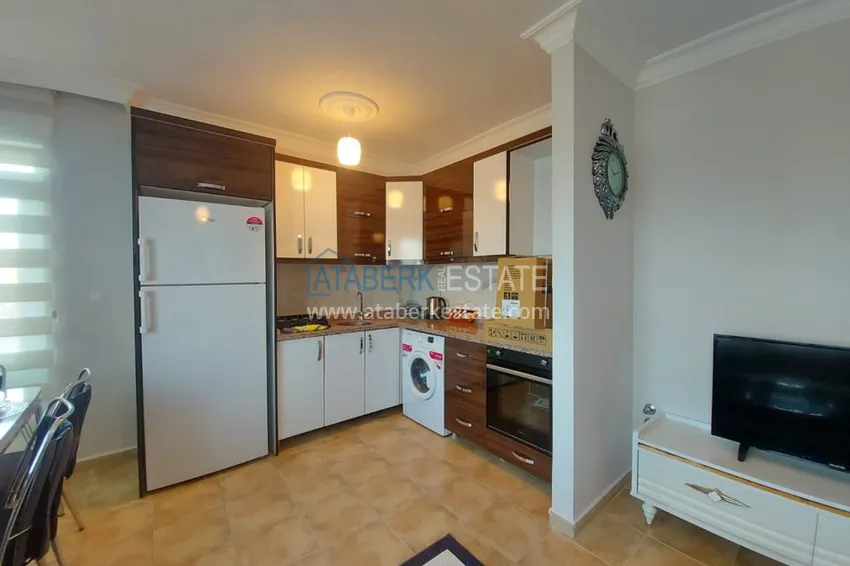 Приобрести Квартира в Махмутларе, с мебелью в жилом доме 3 