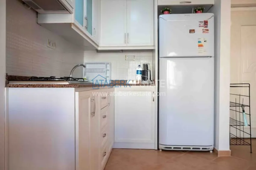 Приобрести Квартира двухкомнатная с мебелью в жилом комплексе в Махмутларе 4 