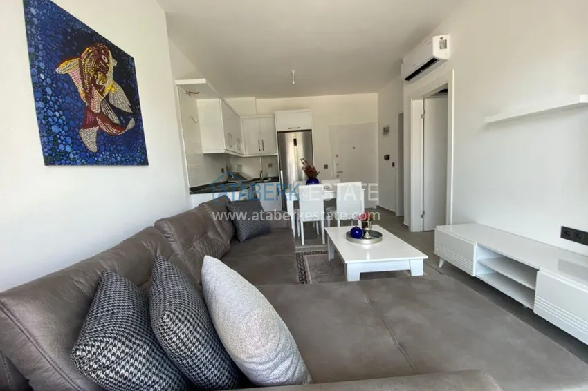 Приобрести Квартира в Махмутларе с новой мебелью в молодом комфортабельном комплексе 4 