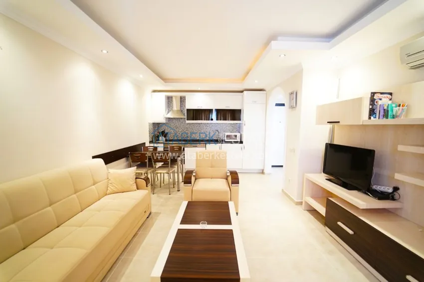 Приобрести Квартира в Махмутларе двухкомнатная с мебелью в комплексе рядом с морем 3 