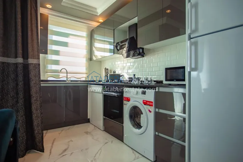 Приобрести Квартира в Махмутларе трехкомнатная, меблированная с видом на горы 3 