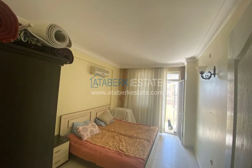 Приобрести Квартира в Махмутларе трехкомнатная - с мебелью в жилом комплексе 5 