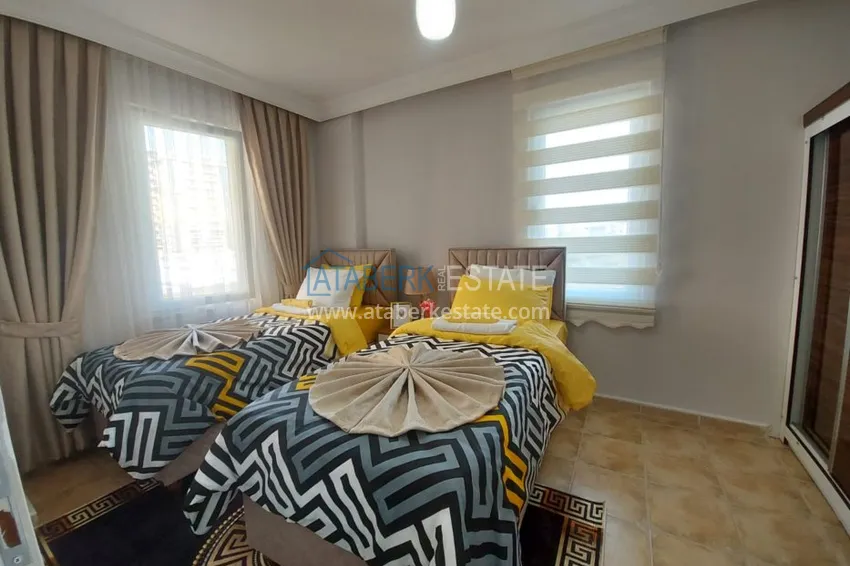 Приобрести Квартира в Махмутларе, с мебелью в жилом доме 4 