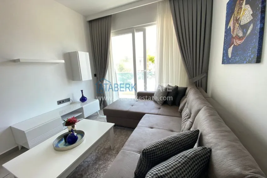 Приобрести Квартира в Махмутларе с новой мебелью в молодом комфортабельном комплексе 5 