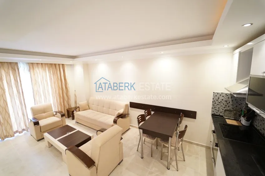 Приобрести Квартира в Махмутларе двухкомнатная с мебелью в комплексе рядом с морем 4 