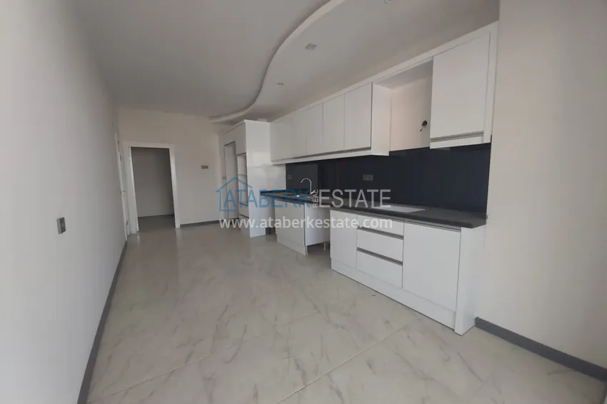 Приобрести Квартира в Махмутларе с отдельной кухней, в многоэтажной новостройке 5 