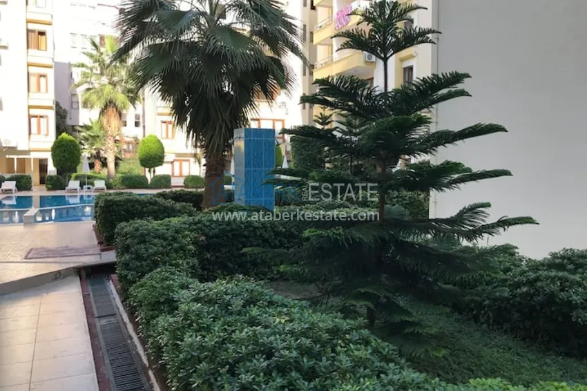 Квартира двухкомнатная с мебелью в жилом комплексе в Махмутларе 4 