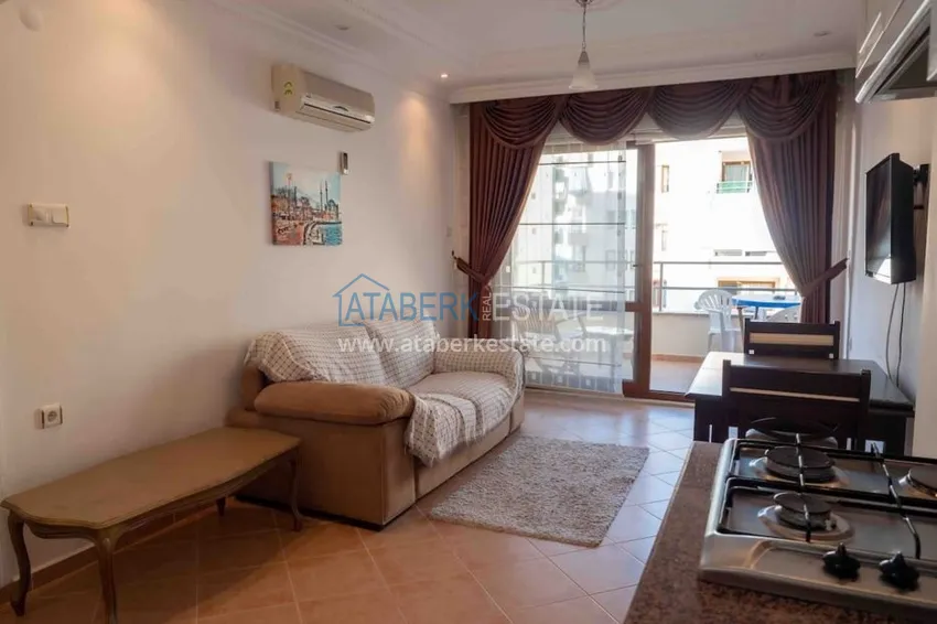 Приобрести Квартира двухкомнатная с мебелью в жилом комплексе в Махмутларе 6 