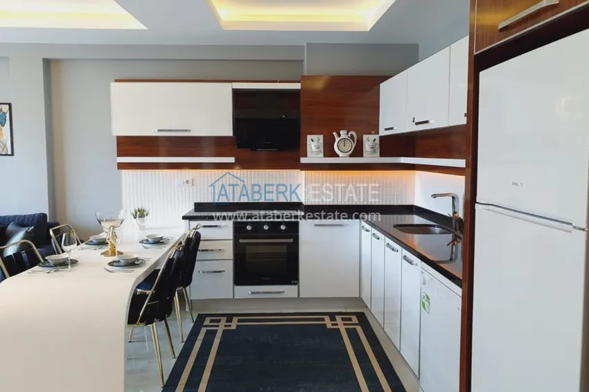 Приобрести Квартира в Махмутларе с мебелью в комфортабельном комплекс  6 