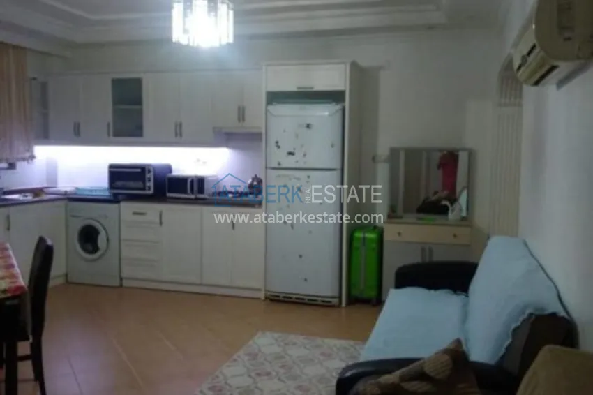 Приобрести Квартира в Махмутларе, двухкомнатная с мебелью в жилом комплексе 5 