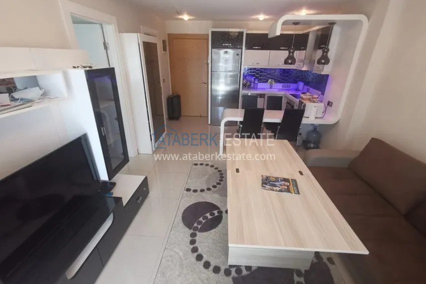 Приобрести Аренда квартиры в Алании, Махмутлар в престижном комплексе с частным пляжем А156  7 