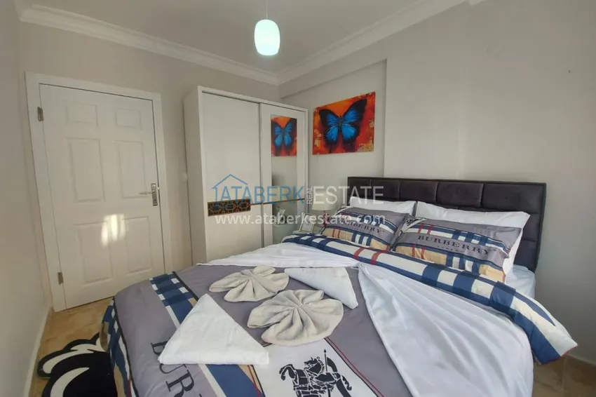 Приобрести Квартира в Махмутларе, с мебелью в жилом доме 6 