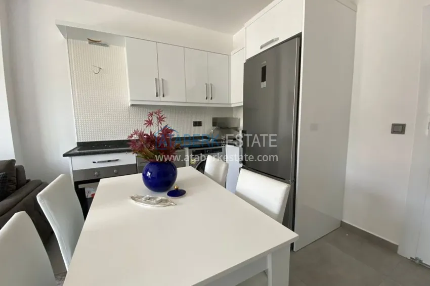 Приобрести Квартира в Махмутларе с новой мебелью в молодом комфортабельном комплексе 7 