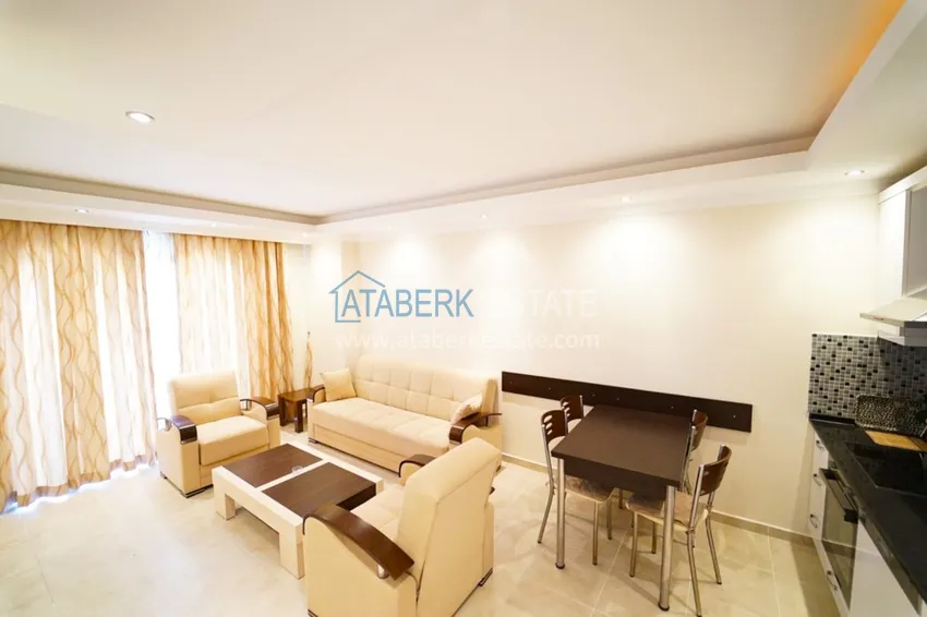 Приобрести Квартира в Махмутларе двухкомнатная с мебелью в комплексе рядом с морем 6 