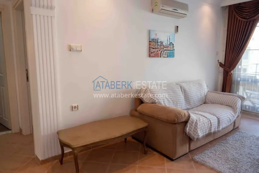 Приобрести Квартира двухкомнатная с мебелью в жилом комплексе в Махмутларе 8 