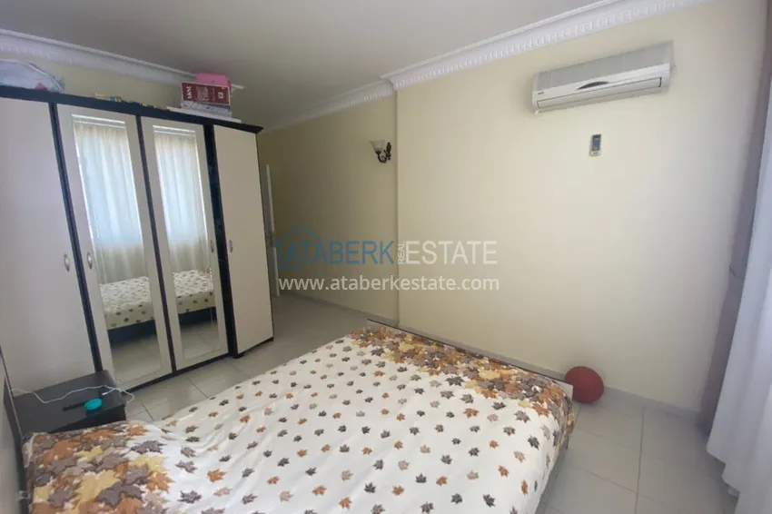 Приобрести Квартира в Махмутларе трехкомнатная - с мебелью в жилом комплексе 8 