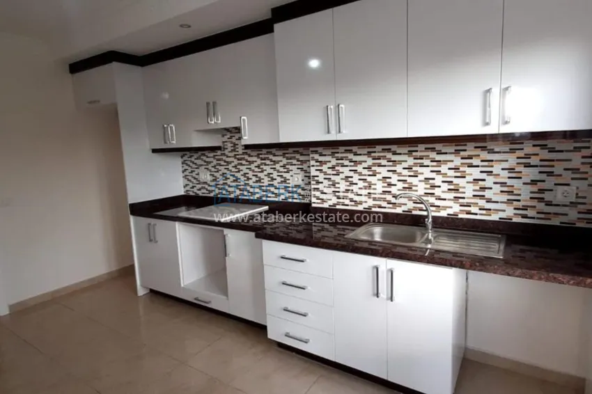 Приобрести Квартира в Махмутларе с чистовой отделкой, 2 спальни, отдельная кухня  7 