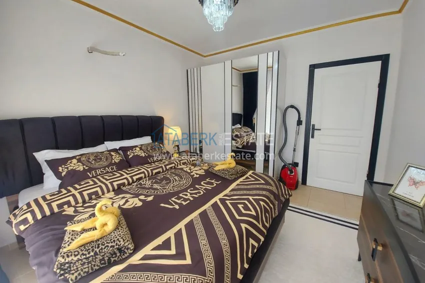 Приобрести Квартира в Махмутларе с мебелью в комплексе на центральной улице 7 