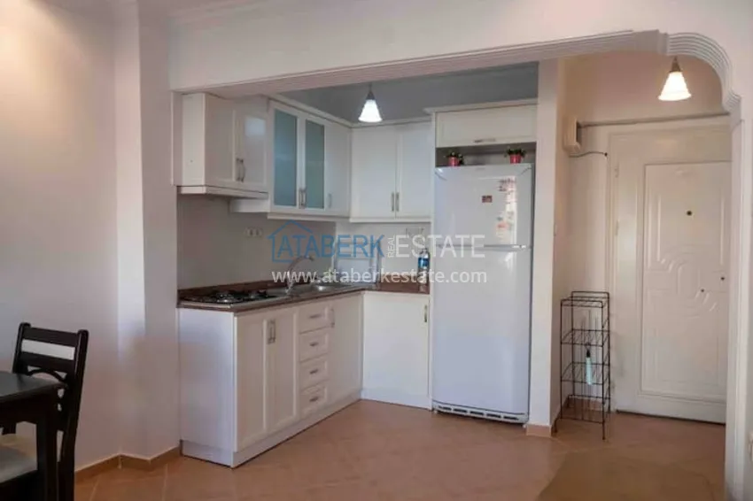 Приобрести Квартира двухкомнатная с мебелью в жилом комплексе в Махмутларе 9 