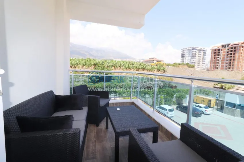 Приобрести Квартира в Махмутларе двухкомнатная с мебелью, вид на горы  7 