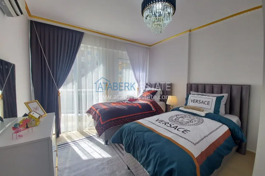 Приобрести Квартира в Махмутларе с мебелью в комплексе на центральной улице 8 