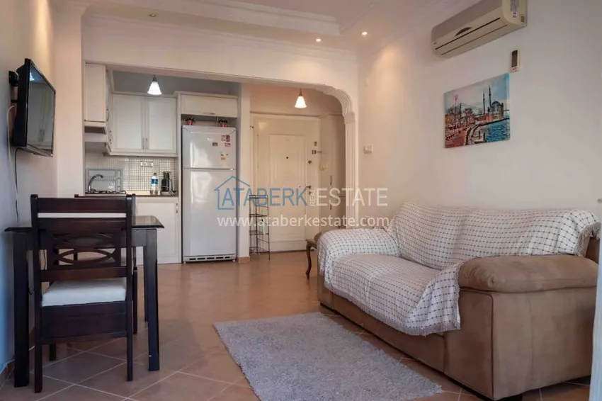 Приобрести Квартира двухкомнатная с мебелью в жилом комплексе в Махмутларе 10 