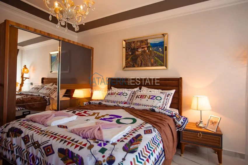 Приобрести Квартира в Махмутларе трехкомнатная, меблированная с видом на горы 9 