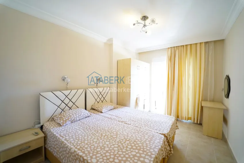 Приобрести Квартира в Махмутларе двухкомнатная с мебелью в комплексе рядом с морем 8 