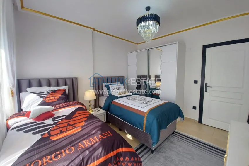 Приобрести Квартира в Махмутларе с мебелью в комплексе на центральной улице 9 