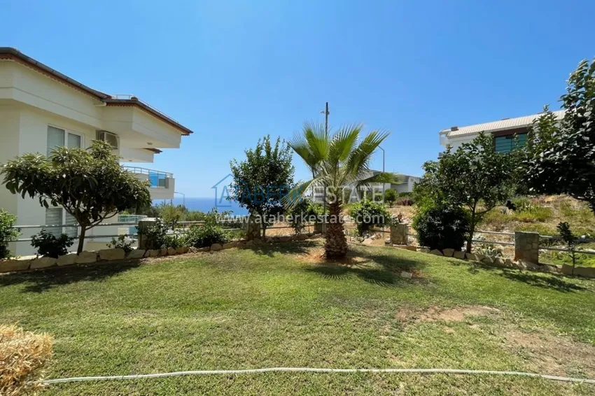 Садовый дуплекс в районе Конаклы Алания в элитной резиденции 10 