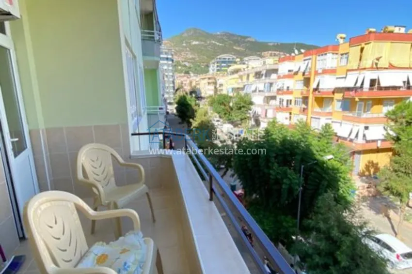 Квартира в центре Алании меблированная с отдельной кухней и видом на горы 1 
