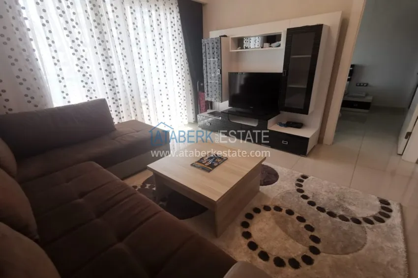 Приобрести Аренда квартиры в Алании, Махмутлар в престижном комплексе с частным пляжем А156  10 