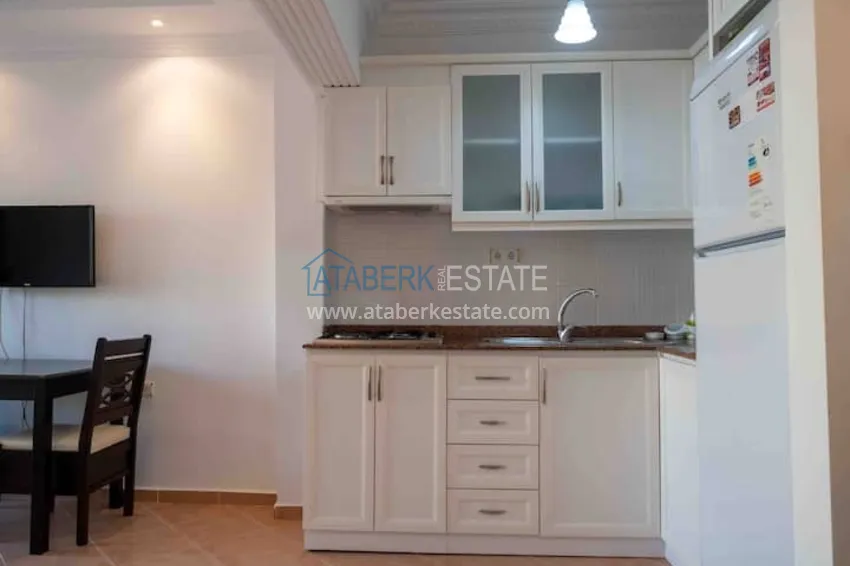 Приобрести Квартира двухкомнатная с мебелью в жилом комплексе в Махмутларе 11 