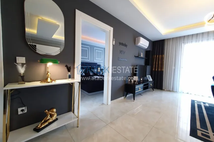 Приобрести Квартира в Махмутларе с мебелью в комфортабельном комплекс  10 