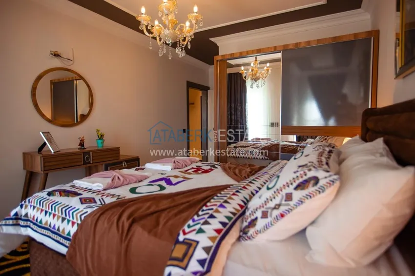 Приобрести Квартира в Махмутларе трехкомнатная, меблированная с видом на горы 10 