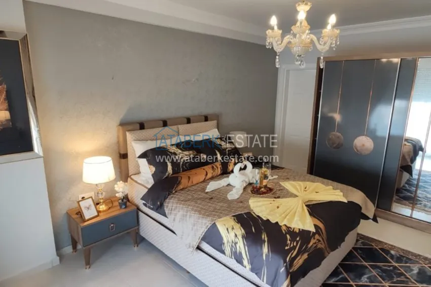 Приобрести Квартира в Махмутларе трехкомнатная с современным интерьером  9 