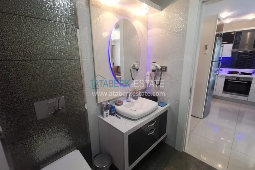 Приобрести Аренда квартиры в Алании, Махмутлар в престижном комплексе с частным пляжем А156  29 